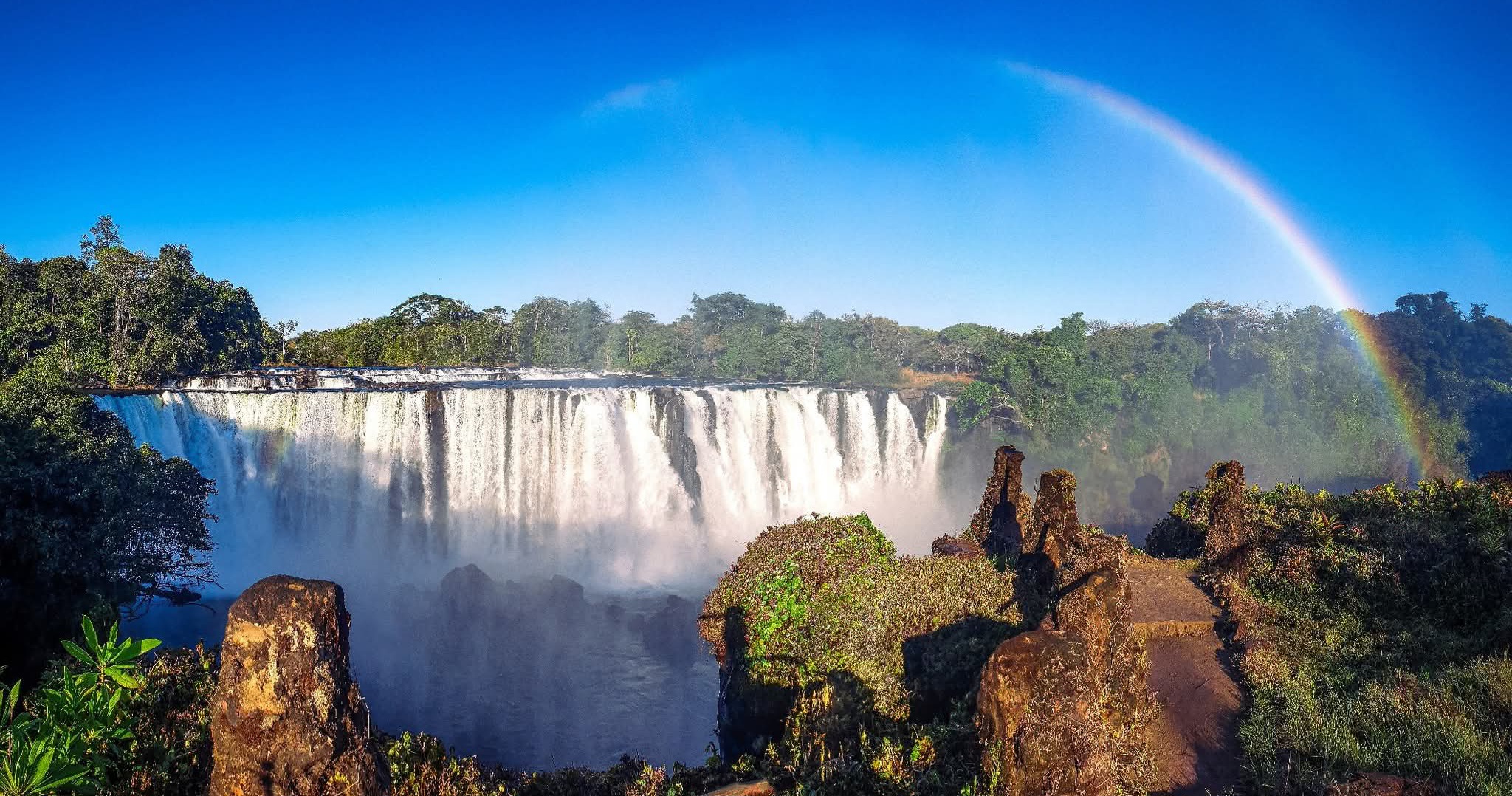 Victoria Falls and rainbow spray from a safari viewpoint